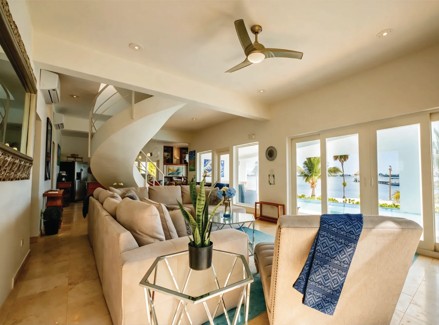 Open-plan living room with lagoon views